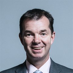 Portrait of Guy Opperman