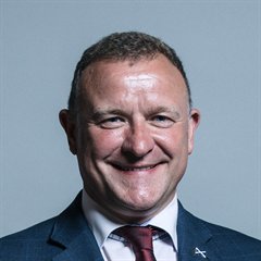 Portrait of Drew Hendry