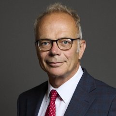 Portrait of Dr Simon Opher